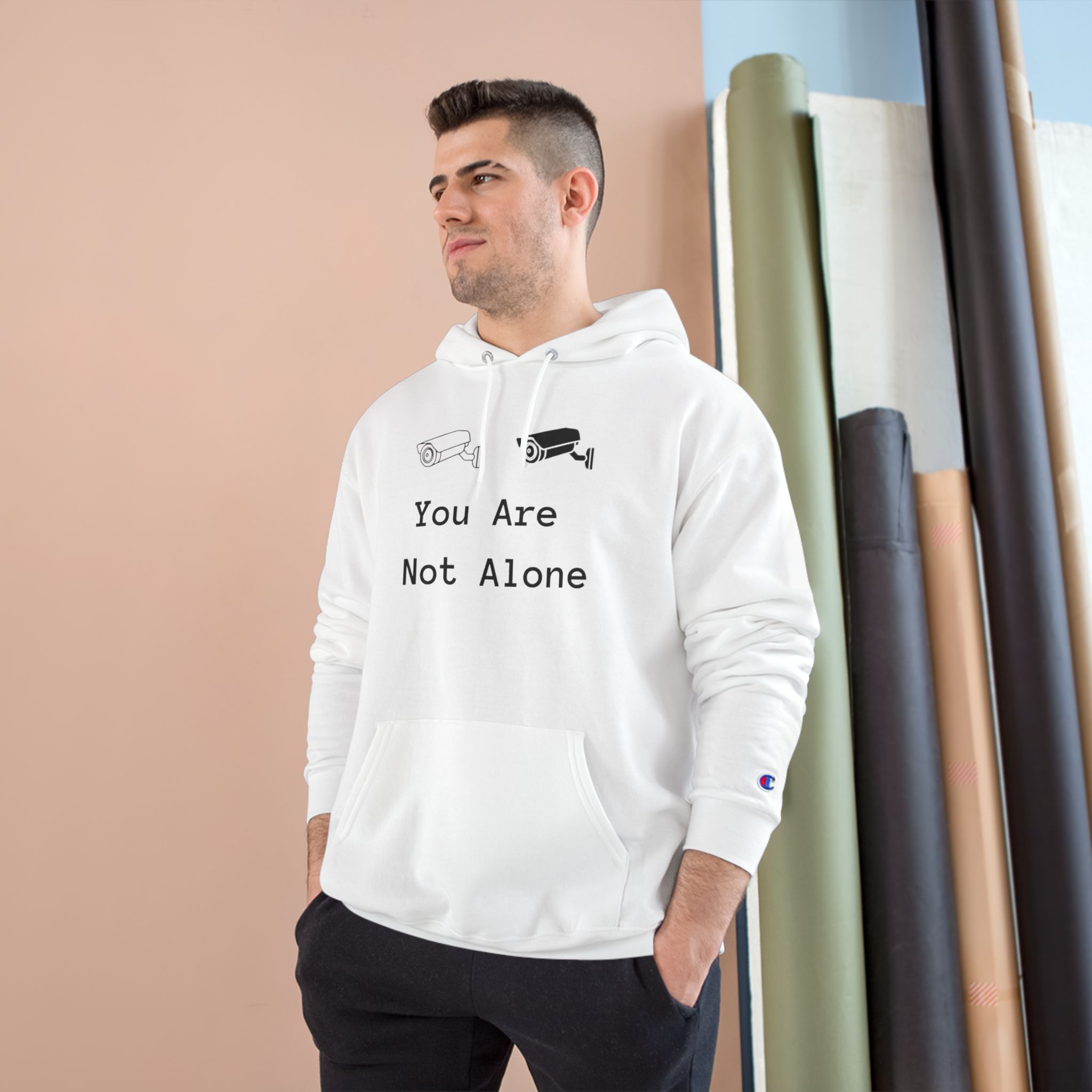 You Are Not Alone Hoodie – Minimalist Surveillance Camera Graphic Champion Hoodie - Image 6